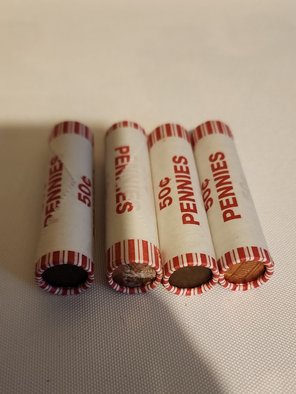 Lot of 4 Unopened Coin Rolls - $2.00 Face Value.